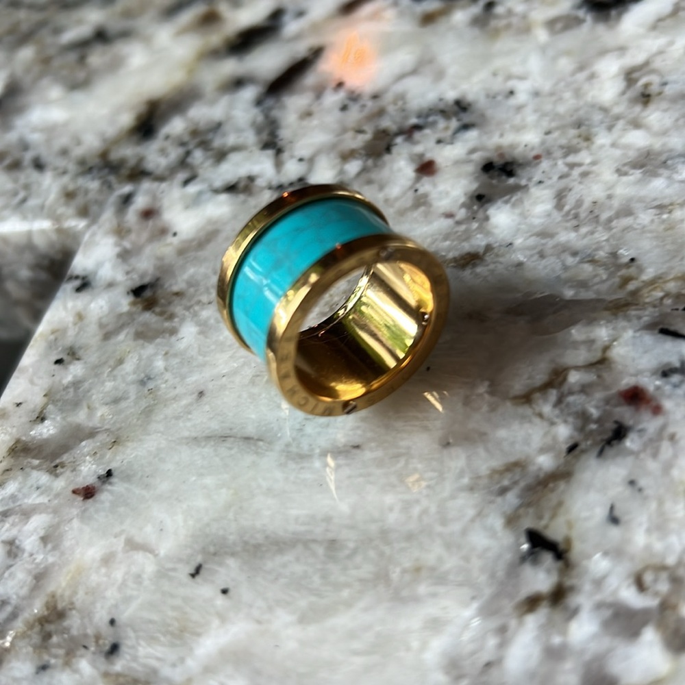 MICHAEL KORS- Gold and Turquoise Ring. Screw Accents on top with Brand.